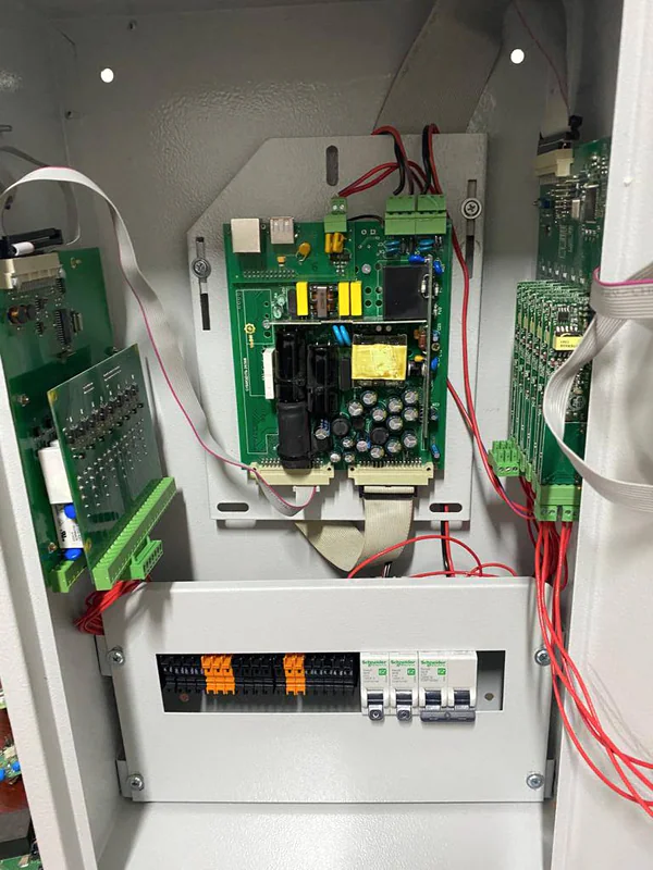 Industrial controller system installed in a monitoring cabinet